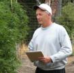 California attorney Chris Van Hook inspects a medical marijuana growing operation.